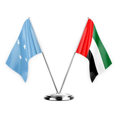 Two table flags isolated on white background 3d illustration, micronesia and united arab emirates