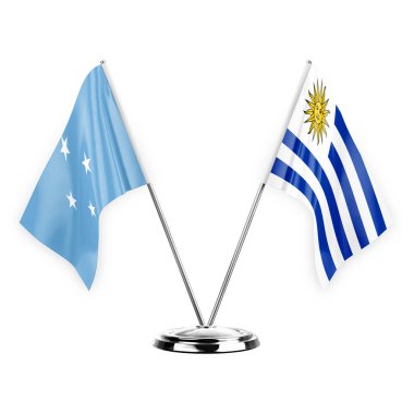 Two table flags isolated on white background 3d illustration, micronesia and uruguay