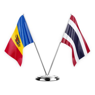 Two table flags isolated on white background 3d illustration, moldova and thailand