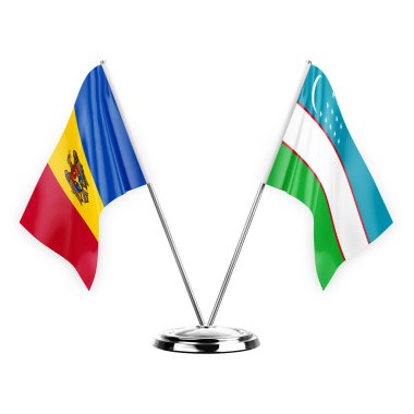 Two table flags isolated on white background 3d illustration, moldova and uzbekistan