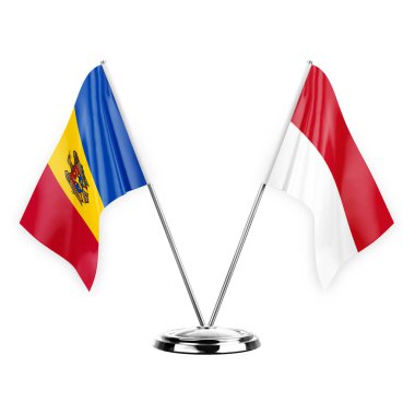 Two table flags isolated on white background 3d illustration, moldova and monaco