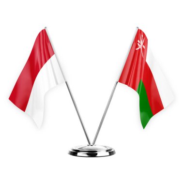 Two table flags isolated on white background 3d illustration, monaco and oman