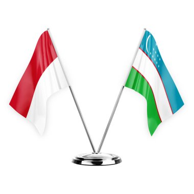 Two table flags isolated on white background 3d illustration, monaco and uzbekistan