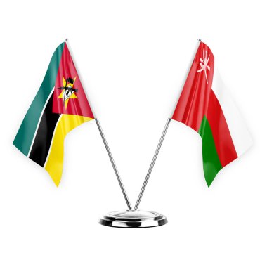 Two table flags isolated on white background 3d illustration, mozambique and oman