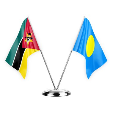 Two table flags isolated on white background 3d illustration, mozambique and palau