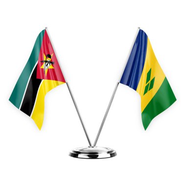 Two table flags isolated on white background 3d illustration, mozambique and saint vincent and the grenadines