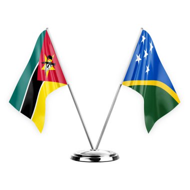 Two table flags isolated on white background 3d illustration, mozambique and solomon islands