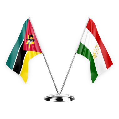 Two table flags isolated on white background 3d illustration, mozambique and tajikistan