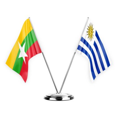 Two table flags isolated on white background 3d illustration, myanmar and uruguay