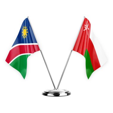 Two table flags isolated on white background 3d illustration, namibia and oman