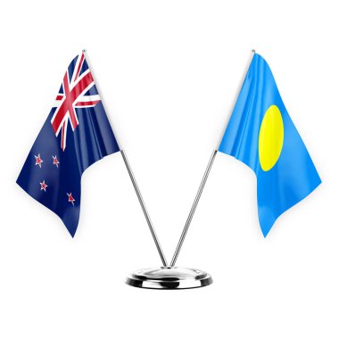 Two table flags isolated on white background 3d illustration, new zealand and palau