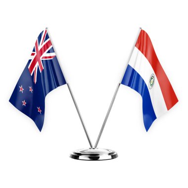 Two table flags isolated on white background 3d illustration, new zealand and paraguay