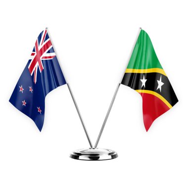 Two table flags isolated on white background 3d illustration, new zealand and saint kitts and venis