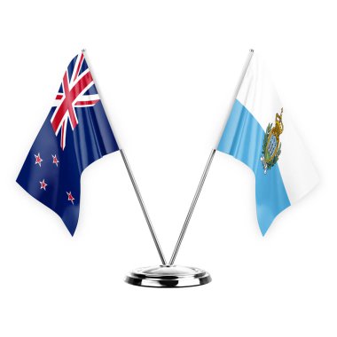 Two table flags isolated on white background 3d illustration, new zealand and san marino