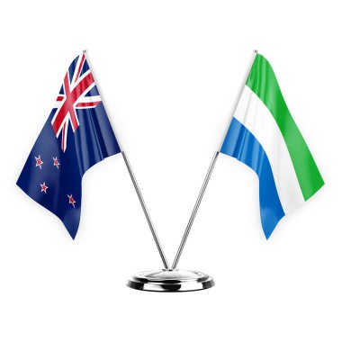 Two table flags isolated on white background 3d illustration, new zealand and sierra leone