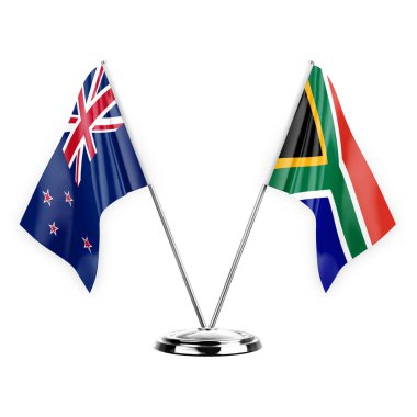 Two table flags isolated on white background 3d illustration, new zealand and south africa