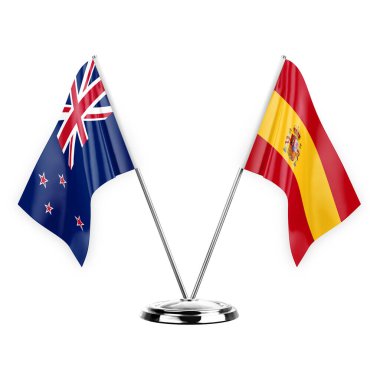 Two table flags isolated on white background 3d illustration, new zealand and spain