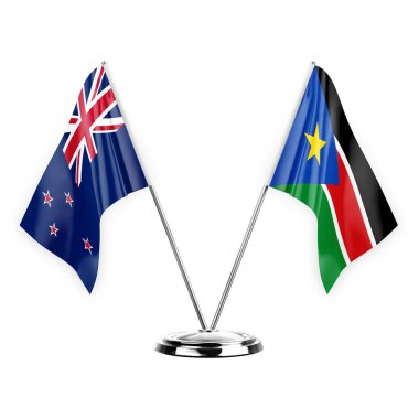 Two table flags isolated on white background 3d illustration, new zealand and south sudan
