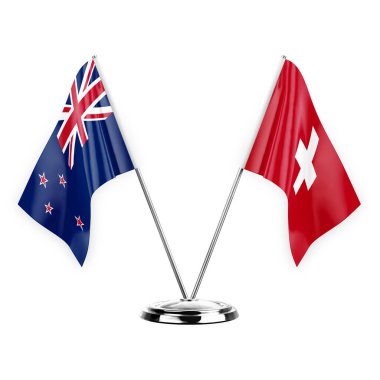 Two table flags isolated on white background 3d illustration, new zealand and switzerland