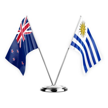 Two table flags isolated on white background 3d illustration, new zealand and uruguay