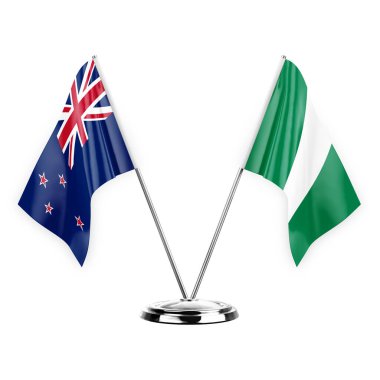 Two table flags isolated on white background 3d illustration, new zealand and nigeria