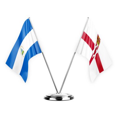 Two table flags isolated on white background 3d illustration, nicaragua and ireland