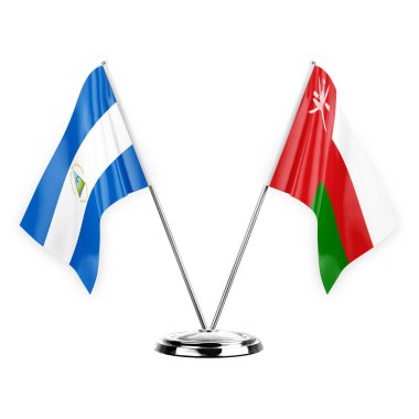 Two table flags isolated on white background 3d illustration, nicaragua and oman