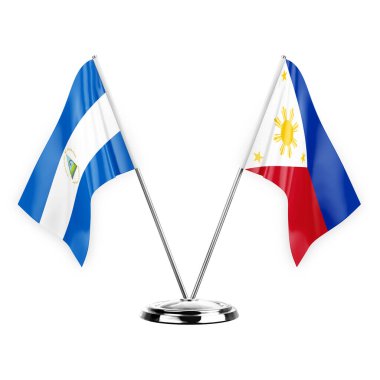Two table flags isolated on white background 3d illustration, nicaragua and philippines