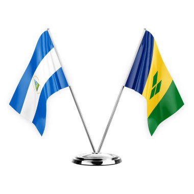 Two table flags isolated on white background 3d illustration, nicaragua and saint vincent and the grenadines