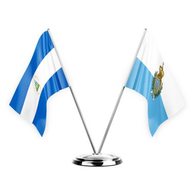 Two table flags isolated on white background 3d illustration, nicaragua and san marino