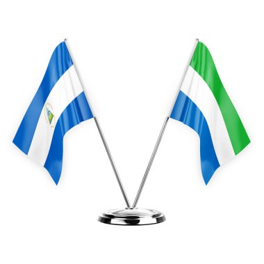 Two table flags isolated on white background 3d illustration, nicaragua and sierra leone