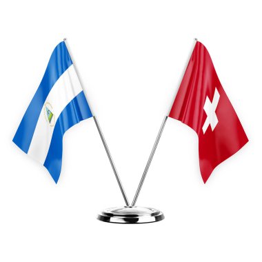 Two table flags isolated on white background 3d illustration, nicaragua and switzerland