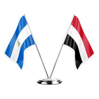 Two table flags isolated on white background 3d illustration, nicaragua and yemen