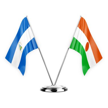 Two table flags isolated on white background 3d illustration, nicaragua and niger