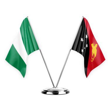 Two table flags isolated on white background 3d illustration, nigeria and papua new guinea