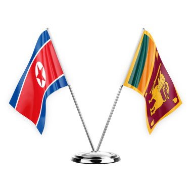 Two table flags isolated on white background 3d illustration, north korea and sri lanka