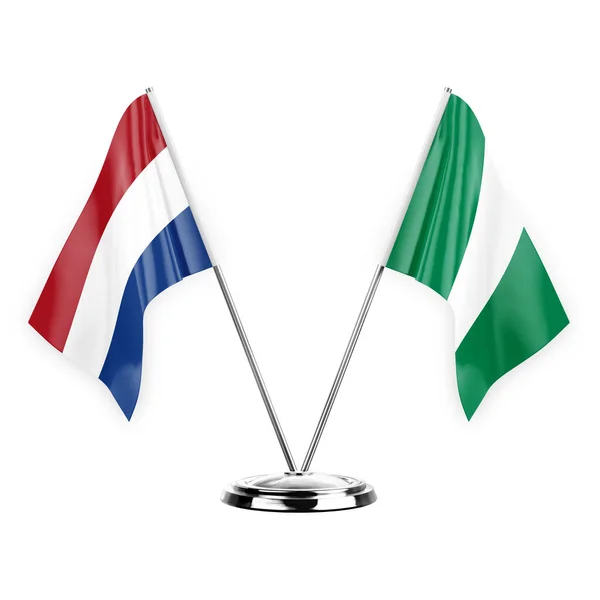 白い背景の3Dイラスト オランダとナイジェリアに隔離された2つのテーブルフラグ — ストック写真