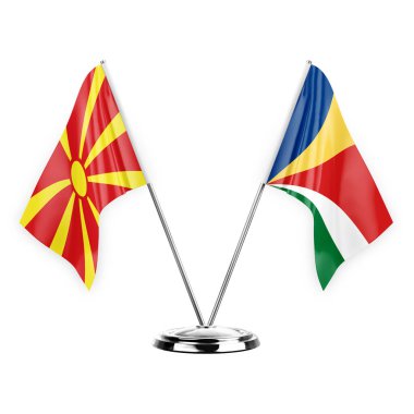Two table flags isolated on white background 3d illustration, north macedonia and seychelles