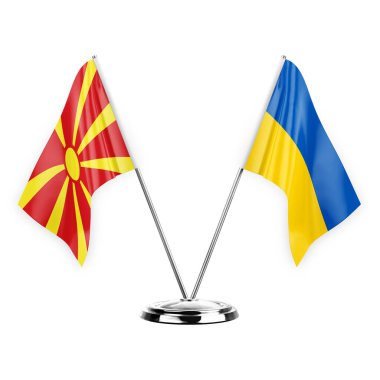 Two table flags isolated on white background 3d illustration, north macedonia and ukraine