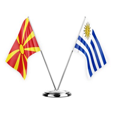Two table flags isolated on white background 3d illustration, north macedonia and uruguay