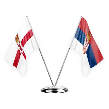 Two table flags isolated on white background 3d illustration, northern ireland and serbia