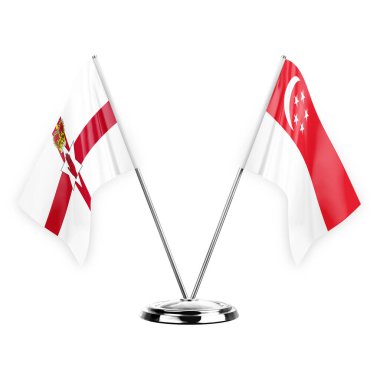 Two table flags isolated on white background 3d illustration, northern ireland and singapore
