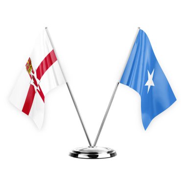 Two table flags isolated on white background 3d illustration, northern ireland and somalia