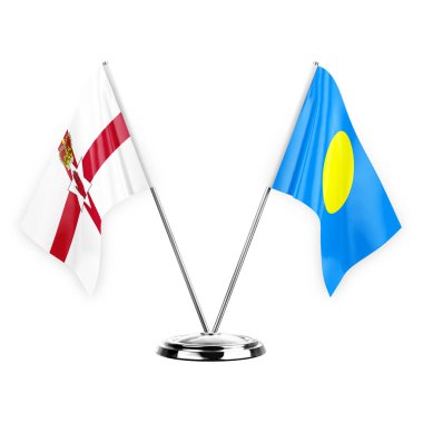 Two table flags isolated on white background 3d illustration, northern ireland and palau