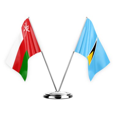 Two table flags isolated on white background 3d illustration, oman and saint lucia
