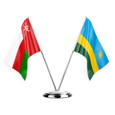 Two table flags isolated on white background 3d illustration, oman and rwanda