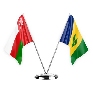 Two table flags isolated on white background 3d illustration, oman and saint vincent and the grenadines