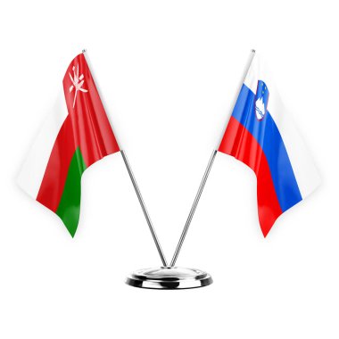 Two table flags isolated on white background 3d illustration, oman and slovenia