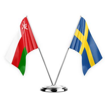 Two table flags isolated on white background 3d illustration, oman and sweden