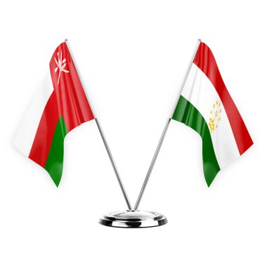 Two table flags isolated on white background 3d illustration, oman and tajikistan